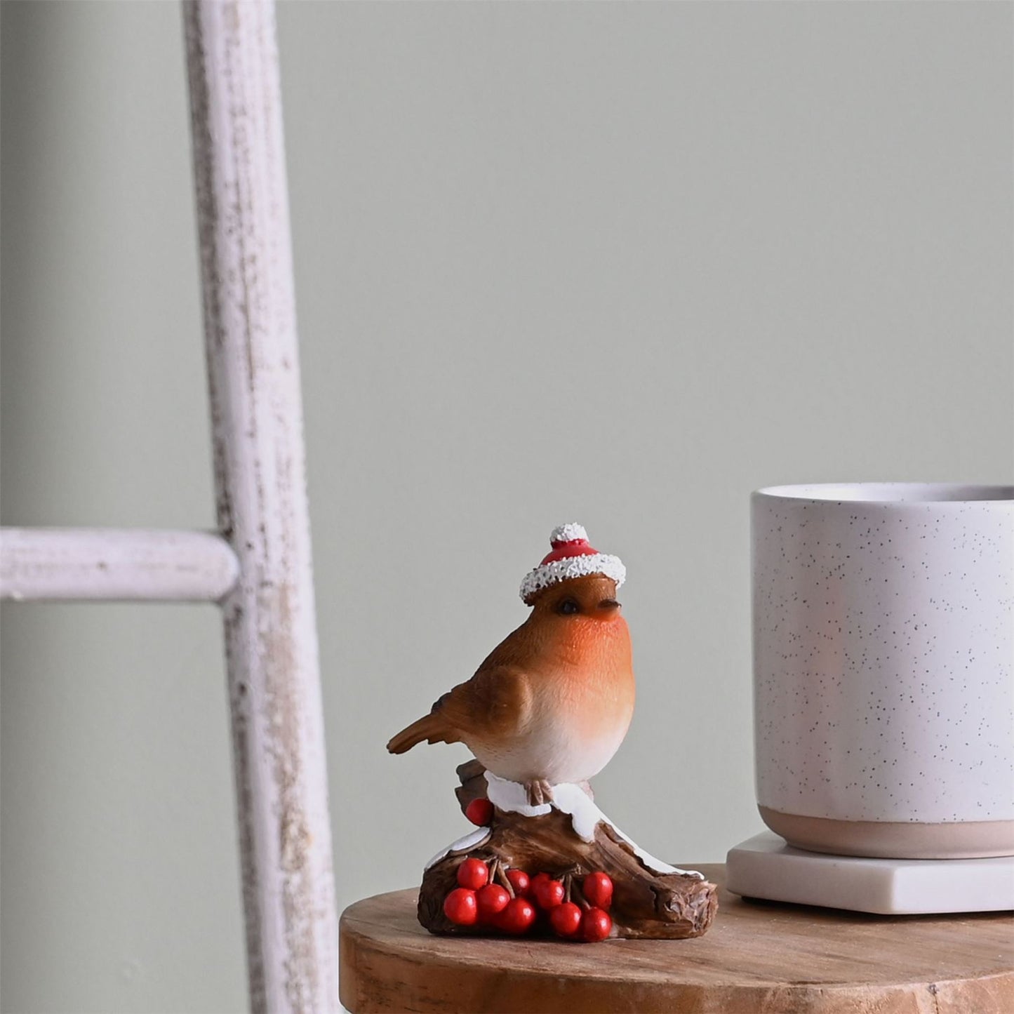 Christmas Robin Figurine on a Branch with Berries