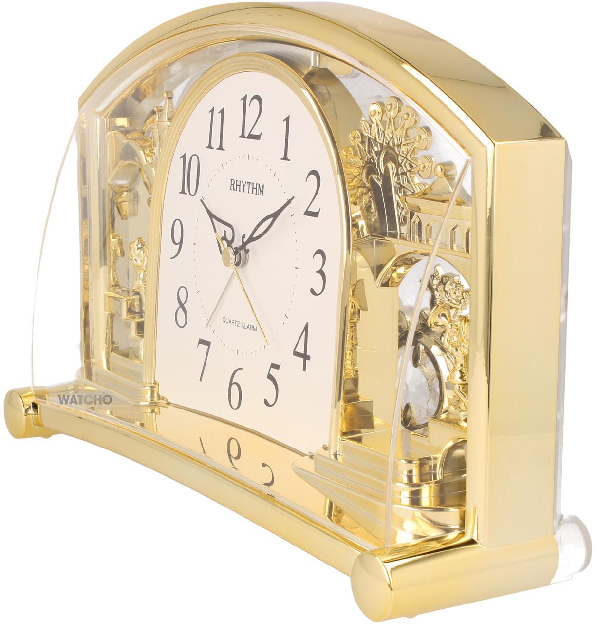 Rhythm Alarm Mantel Clock with Rotating Swarovski Crystal Pendulum Gilt