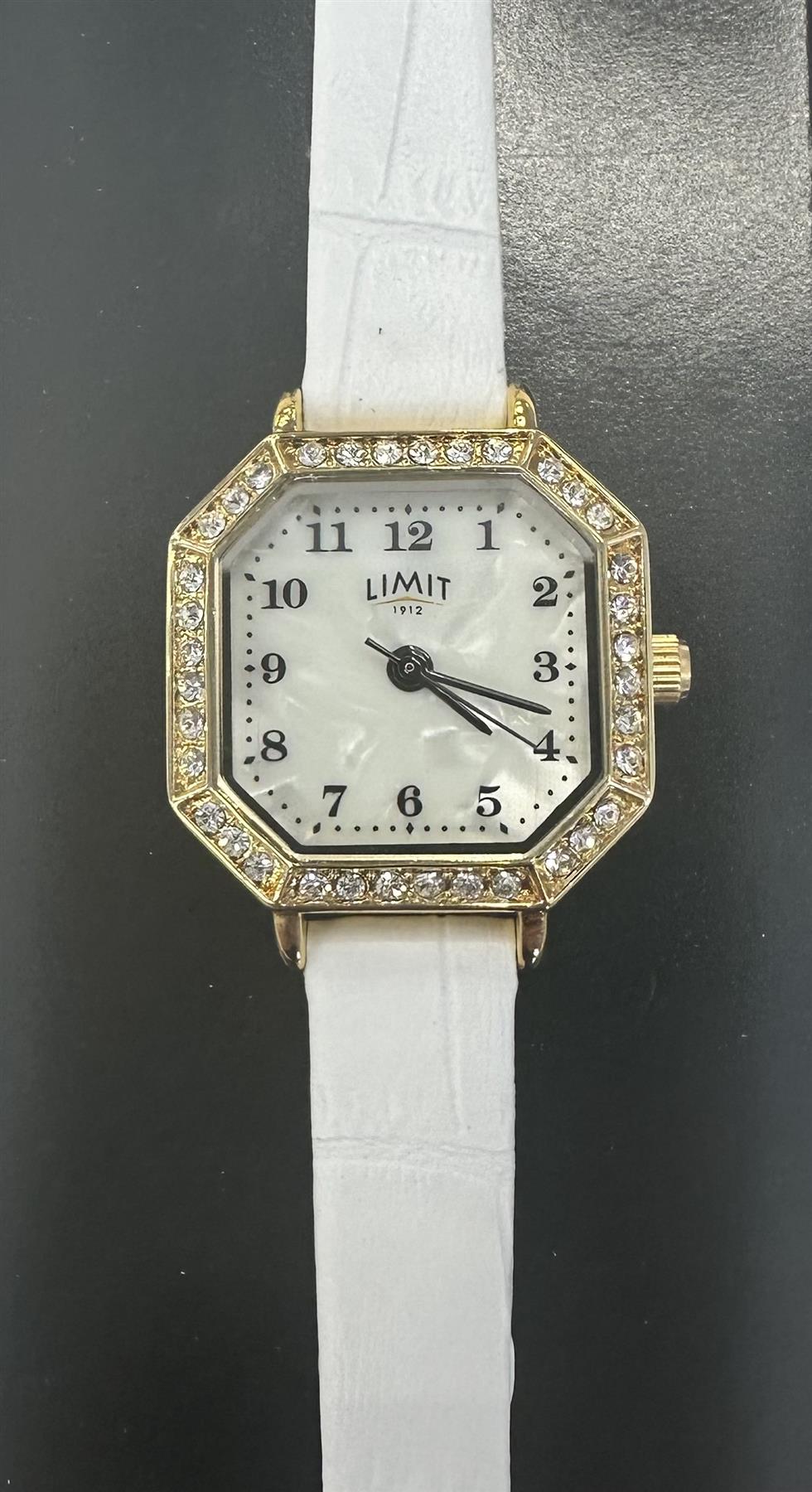 Limit Ladies gold case white strap watch