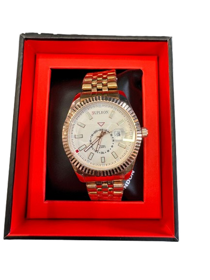 A gold-tone Rolex Submariner watch with a white dial, presented inside its red-lined black gift box.