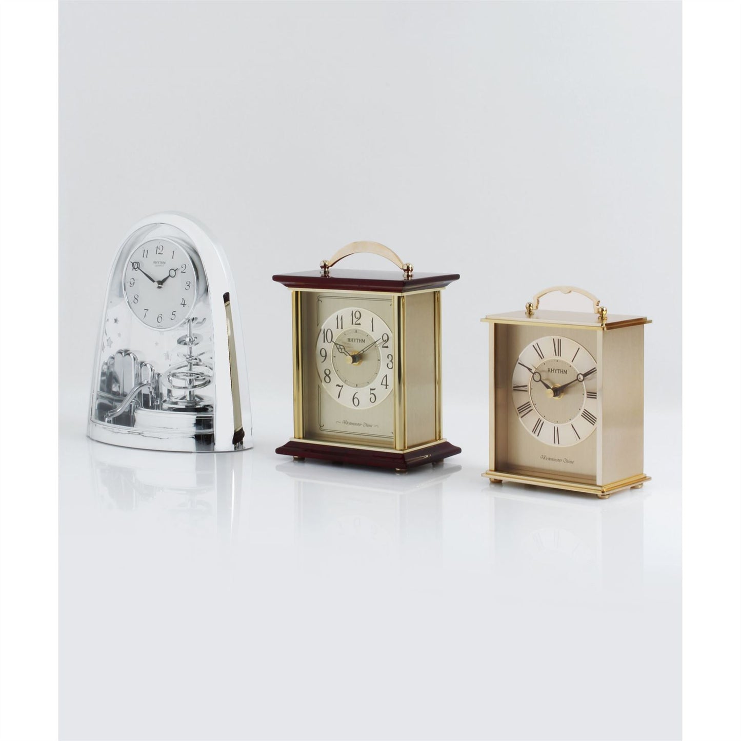 Rhythm Cont Mantel Clock Arched Top/Sprial Pendulum Silver