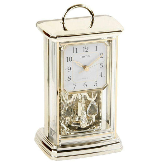 Rhythm Cont Oblong with Handle Arab Dial Rotating Pendulum Gilt colour side Mantle Clock