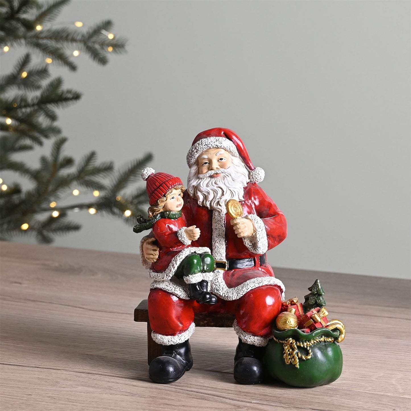 Santa and Child Figurine