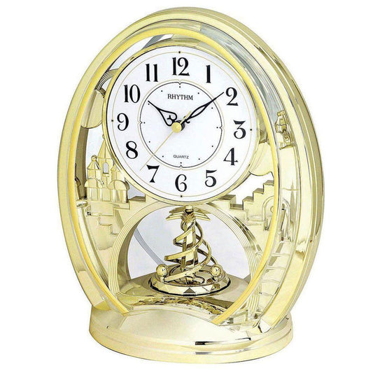 Rhythm Cont  Oval Gilt/Arabic Dial/Rotating Spiral Pendulum Mantel Clock