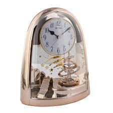 4SG607WB13 RHYTHM CONTEMPORARY MOTION CLOCK ROTATING PENDULUM ROSE GOLD COLOR CASE